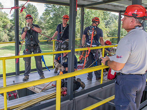 A technical rescue team preparing for training at the Roco Training Center